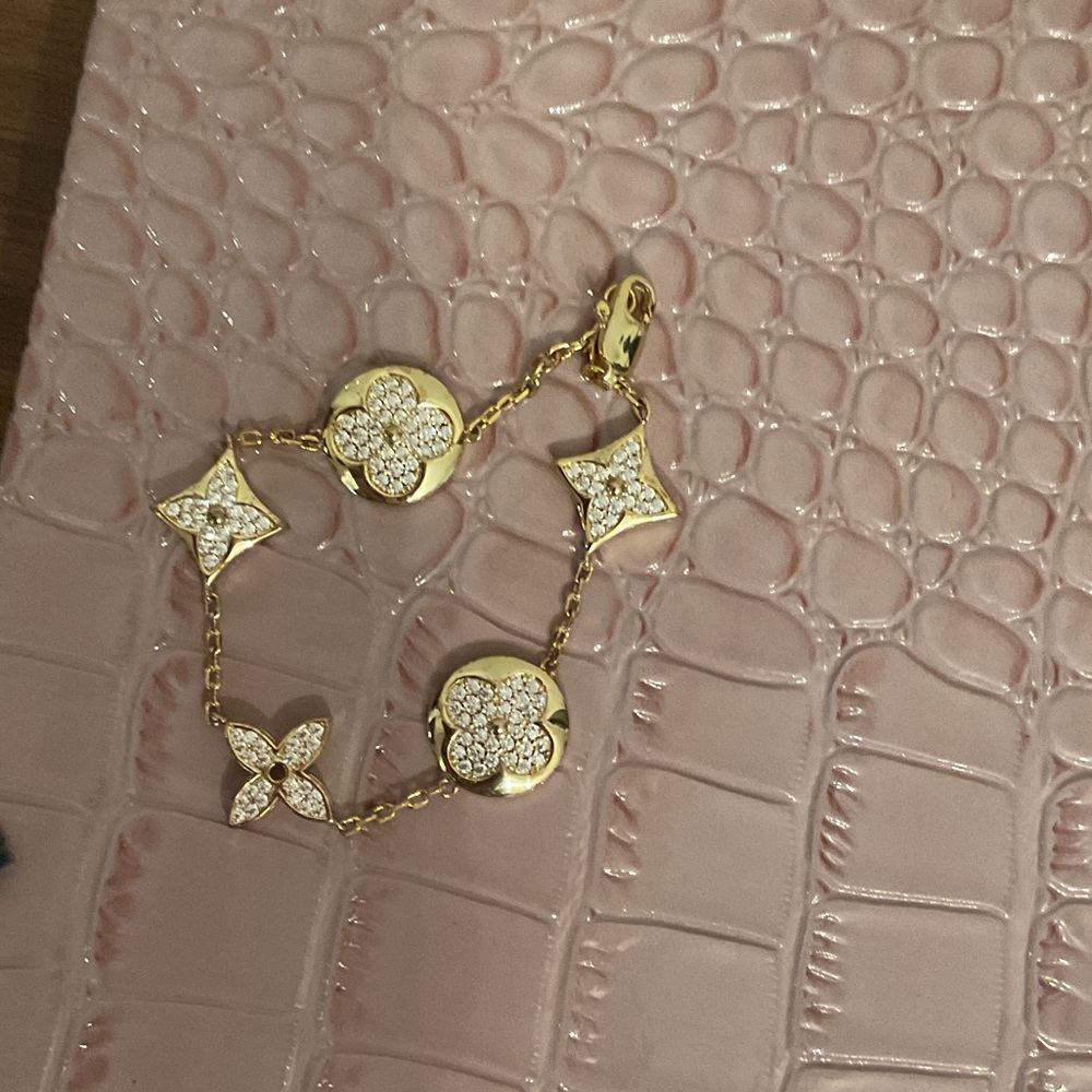 Gold and Silver Charm Bracelet